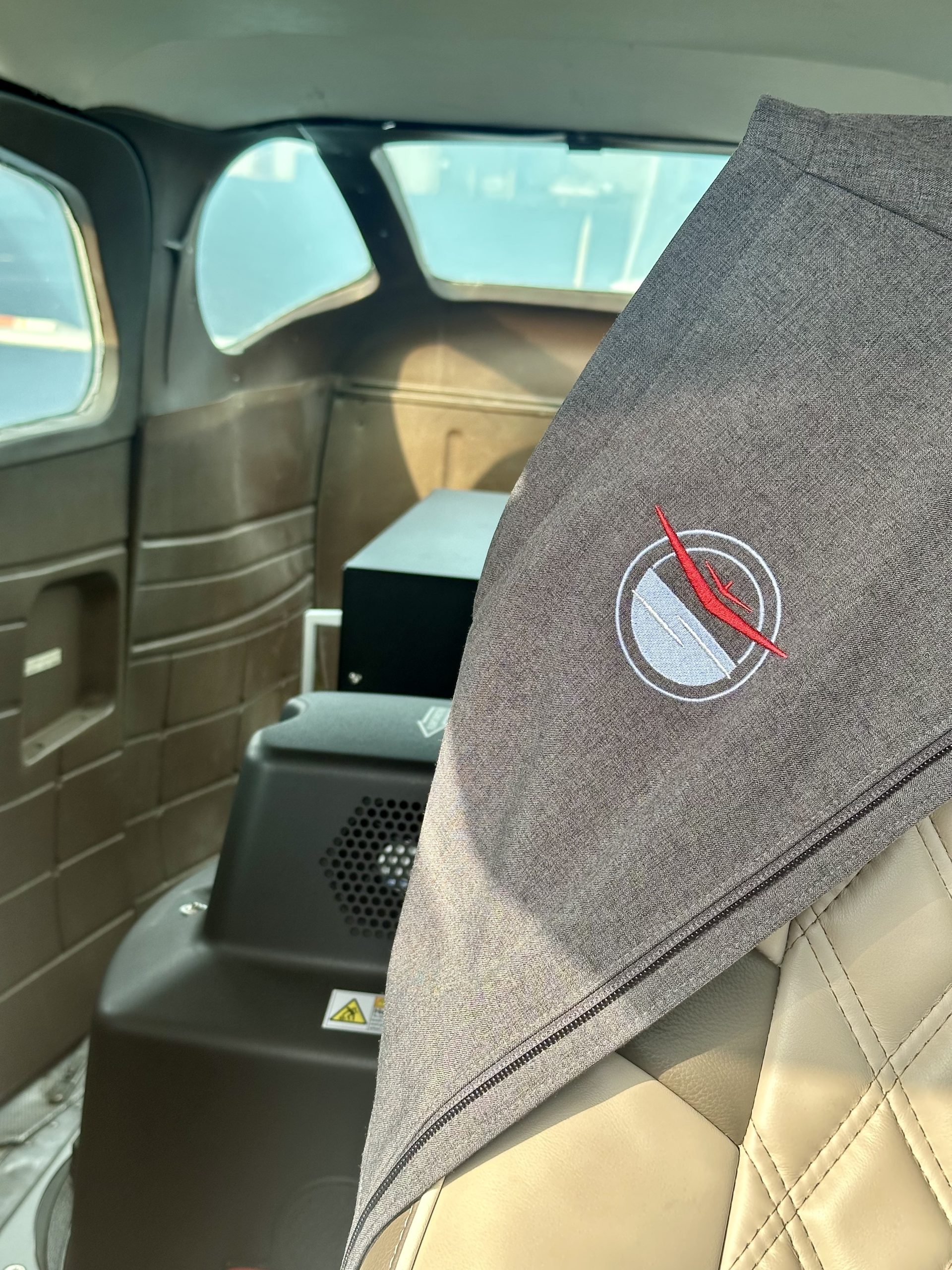 Logo in Cabin scaled 1